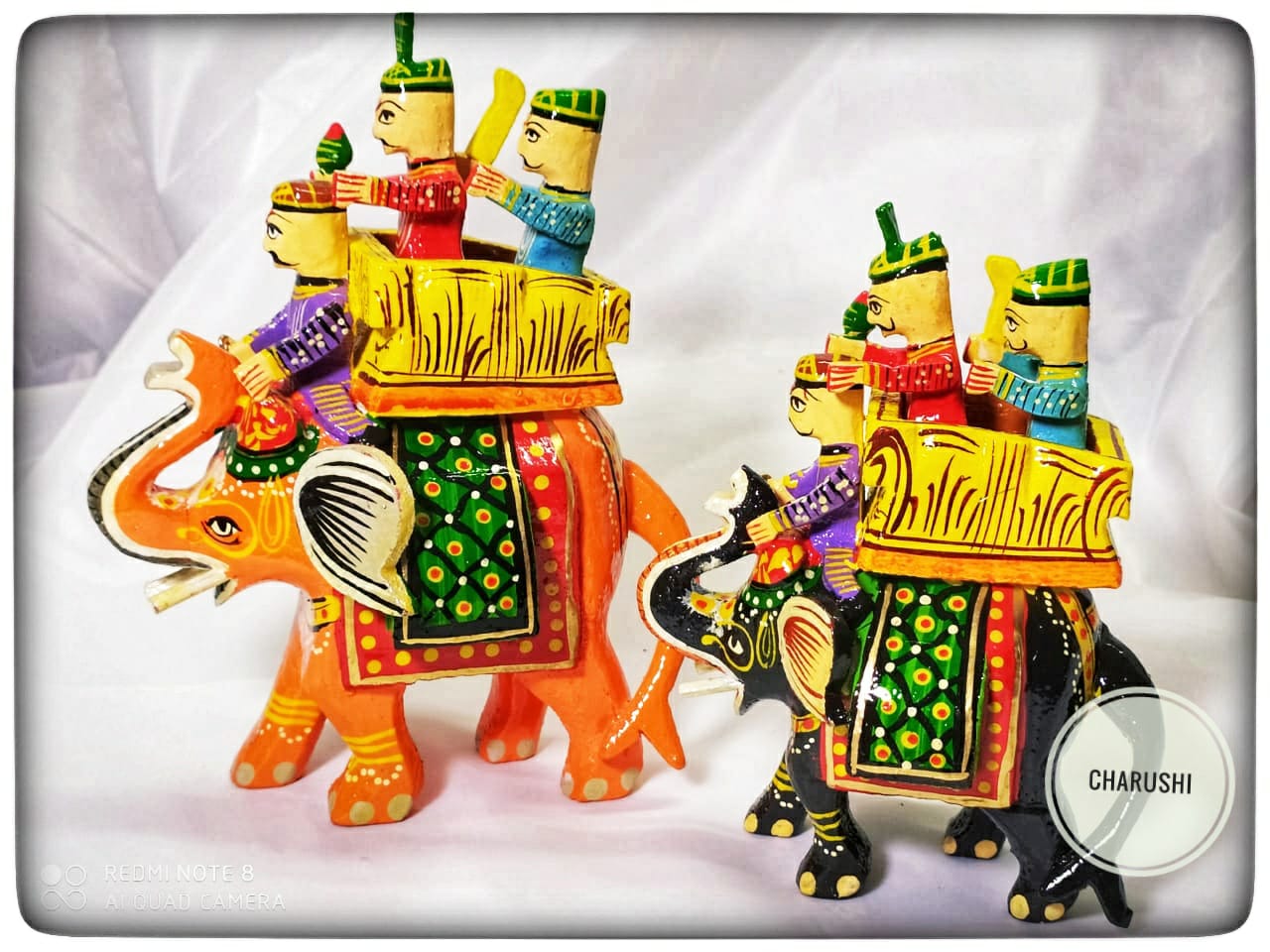 454f8435-5c45-46c3-b1d2-94ebd4e22089 Handcrafted wooden elephant