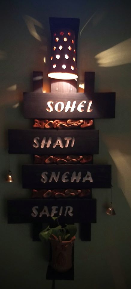 86667291_2676939939090279_7535096143135375360_n Name plate with lamp & plants