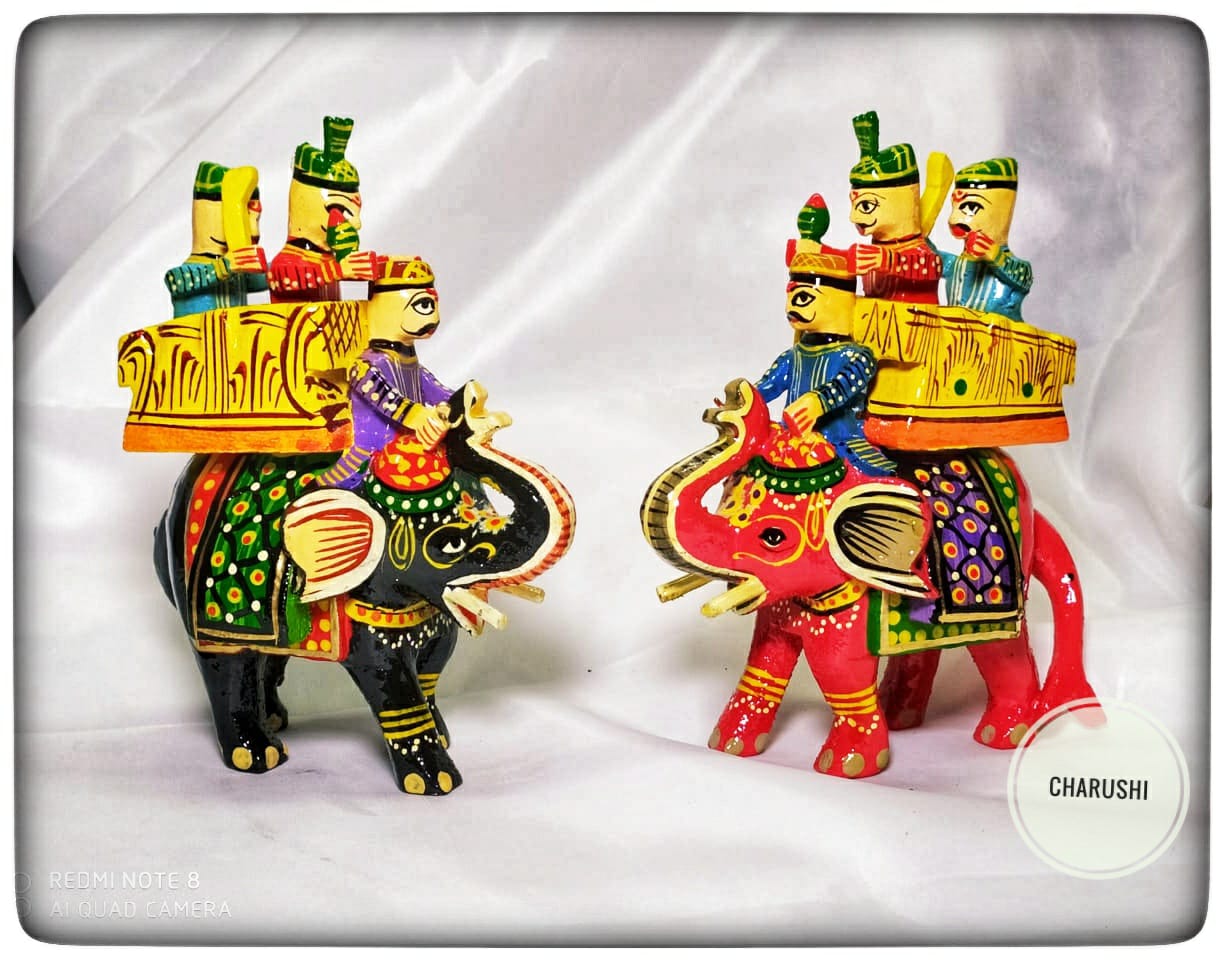 909c333f-039e-45e5-b1e2-a11a3b8da109 Handcrafted wooden elephant